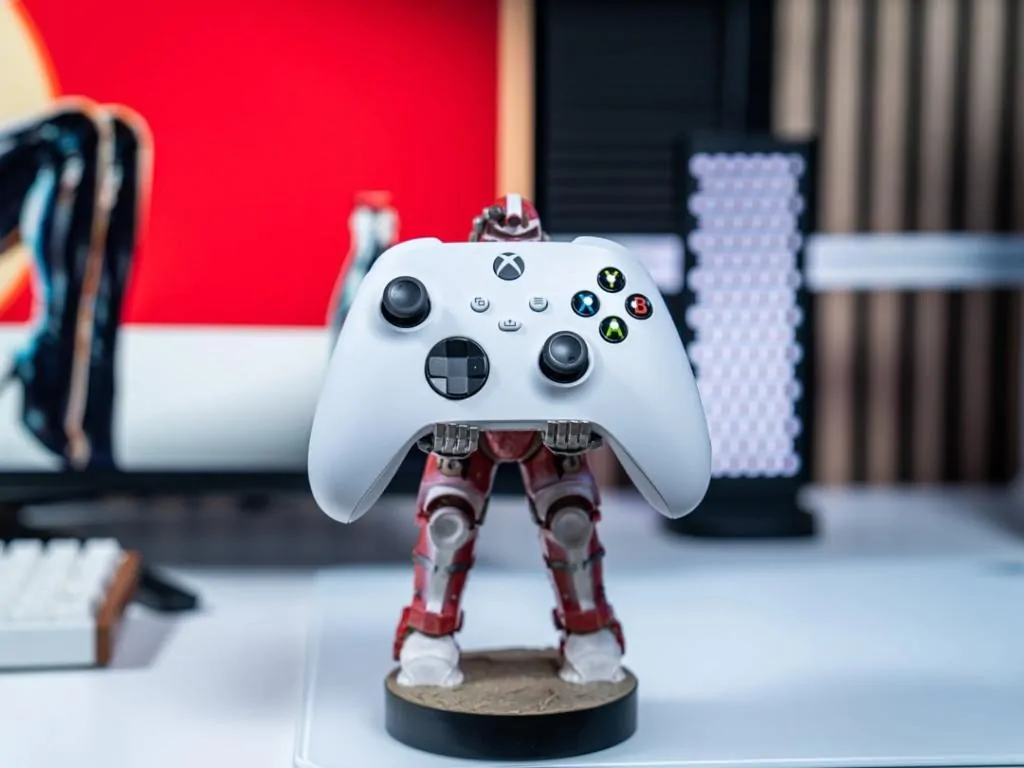 Fallout Nuka Cola Power Armour Cable Guys držiak na ovládač a stojan na telefón produktová fotografia